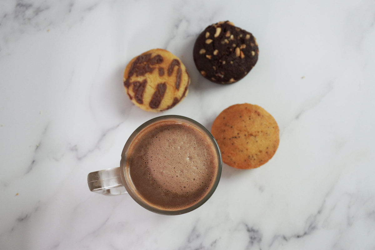 An Image of Hot Cocoa With Cake Bites